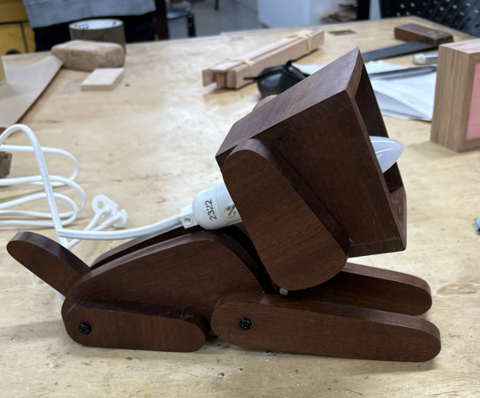 Adjustable wooden dog lamp in different poses